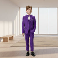 Person wearing a purple/violet suit in a modern indoor setting